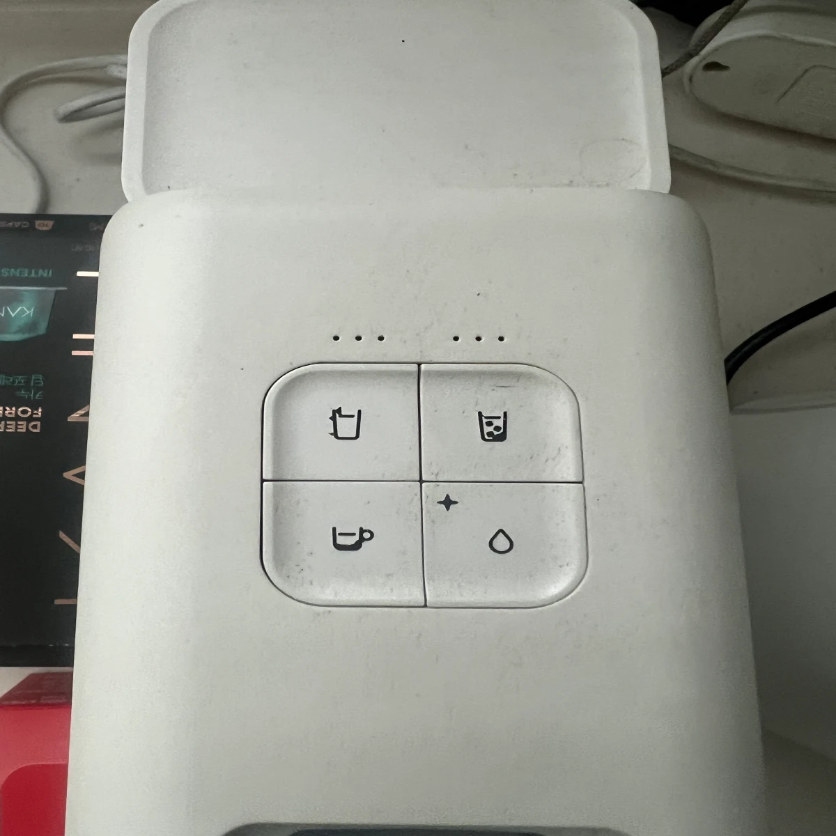 카누-바리스타-페블-커피-머신의-4개-작동-버튼